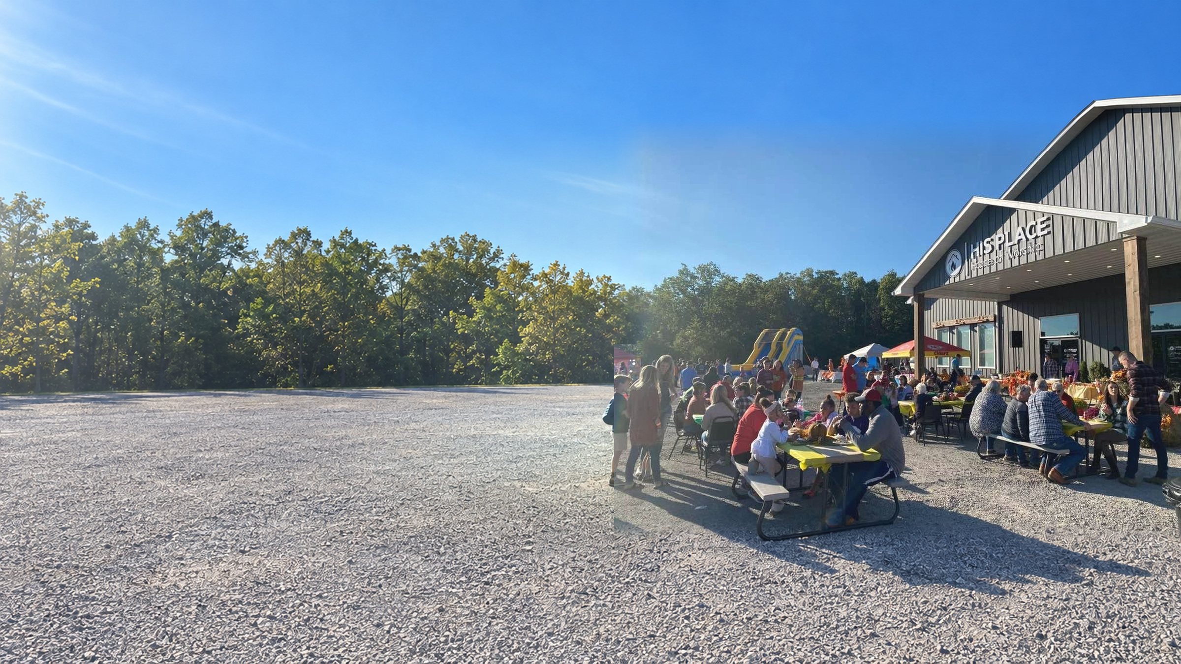 Families at picnic tables outside the His Place House of Worship building at a school event